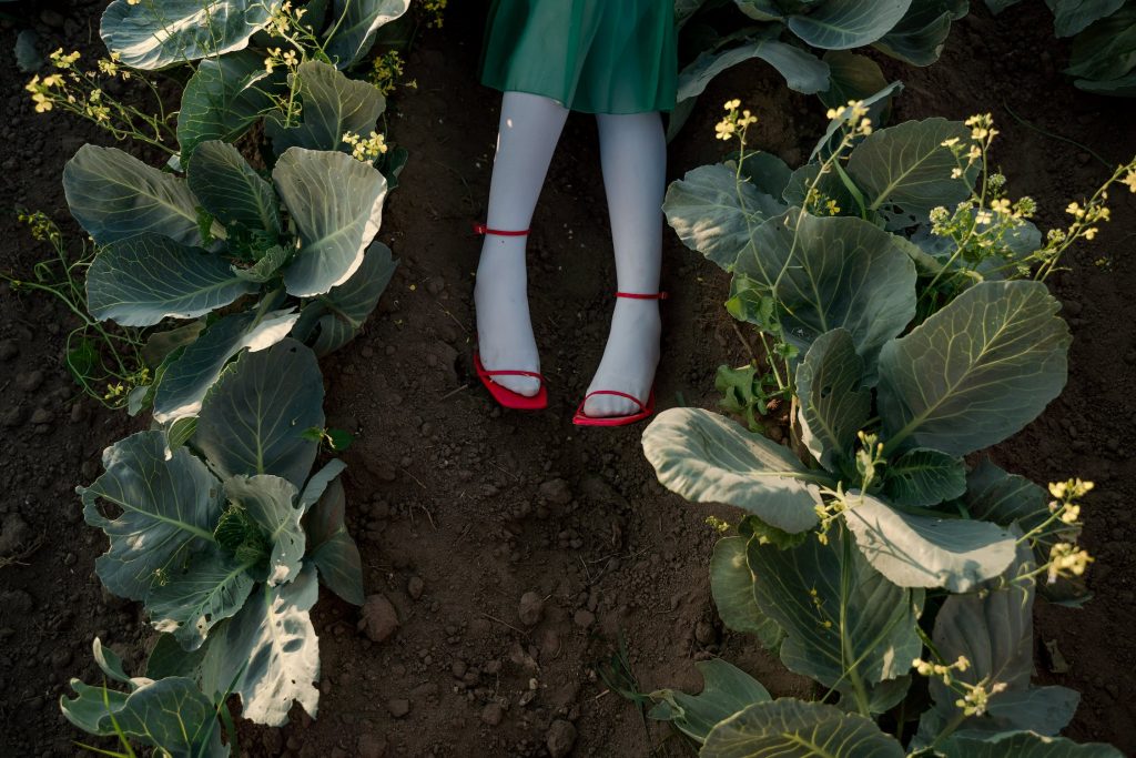 photo of a woman in a farmland
